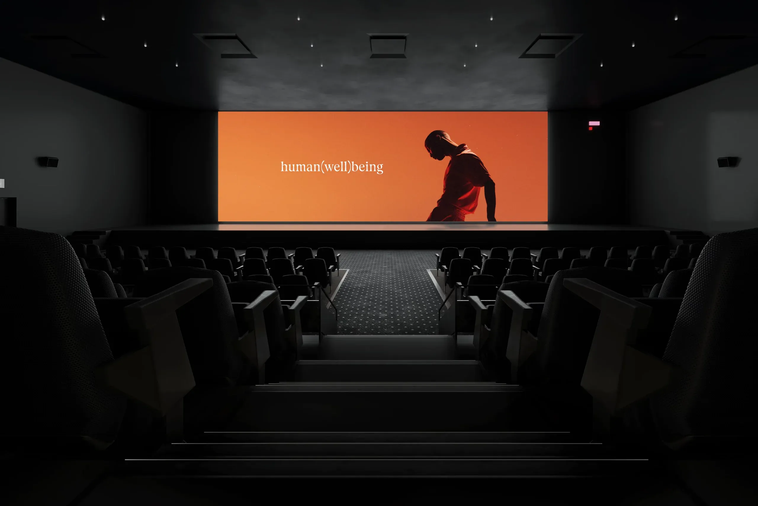 A cinema auditorium with Endor’s “human(well)being” campaign on the big screen.