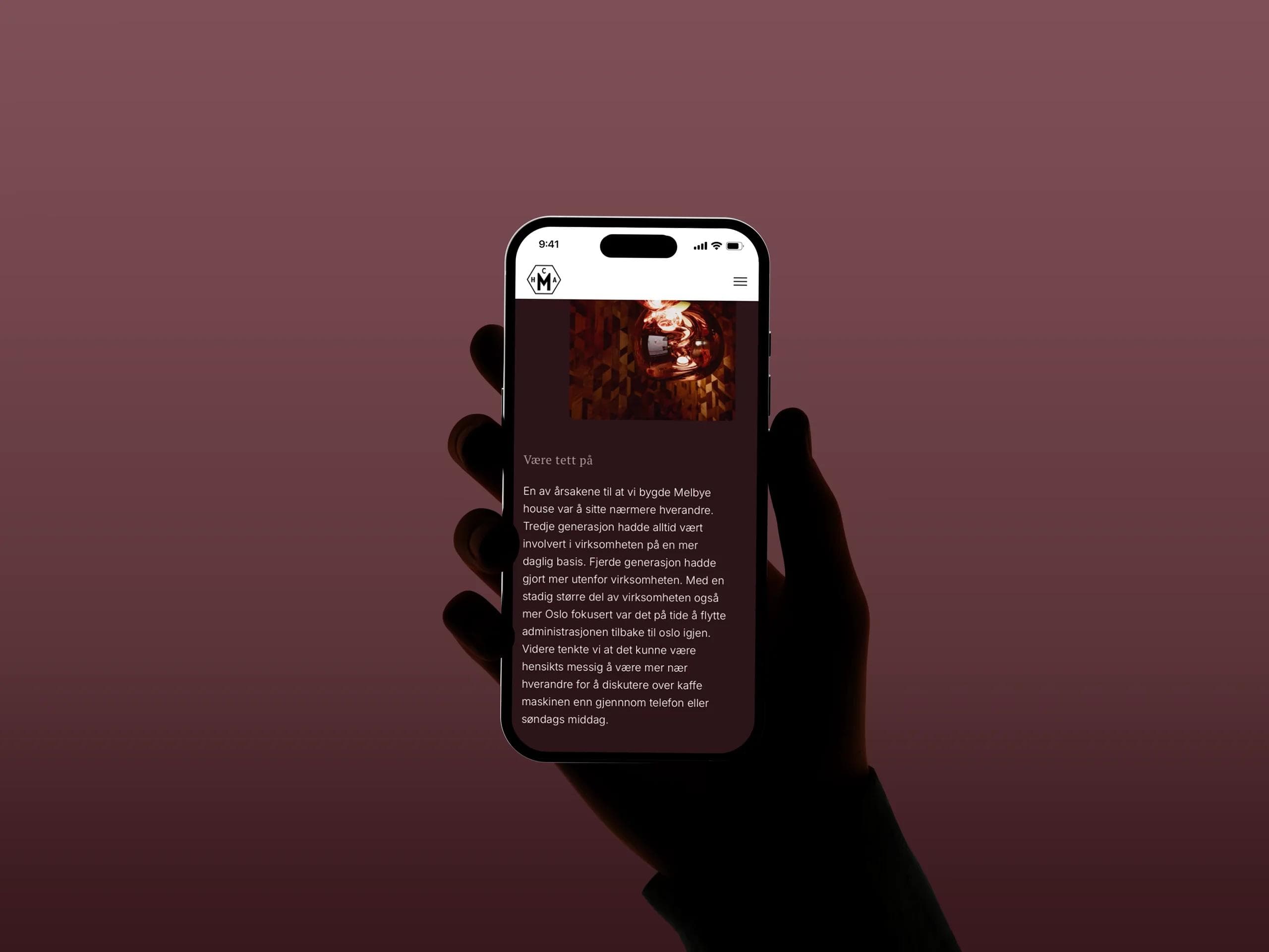 Archival photography and wine-toned brand colours on the H.C.A Melbye site, viewed on a phone